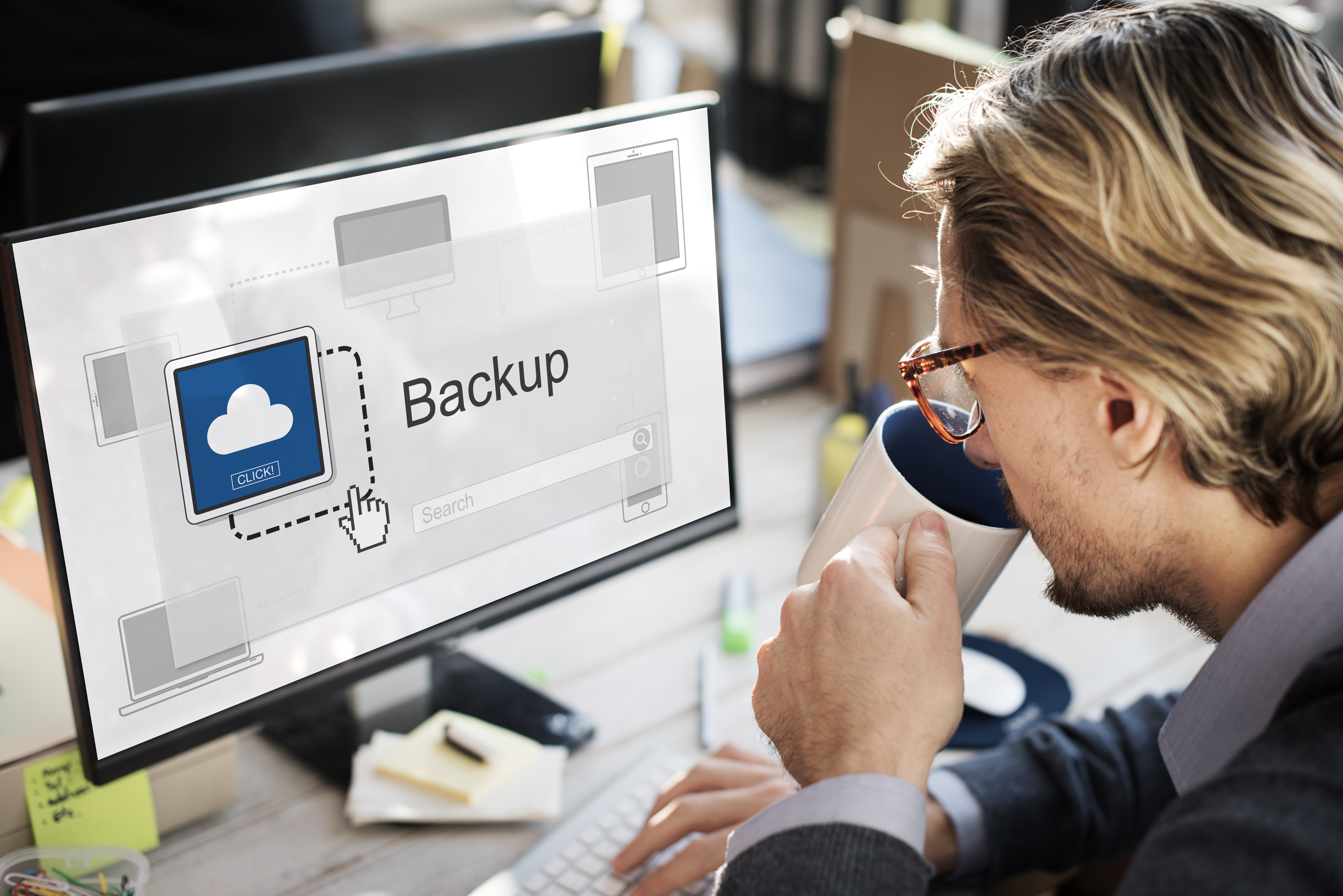backup icon on computer with man
